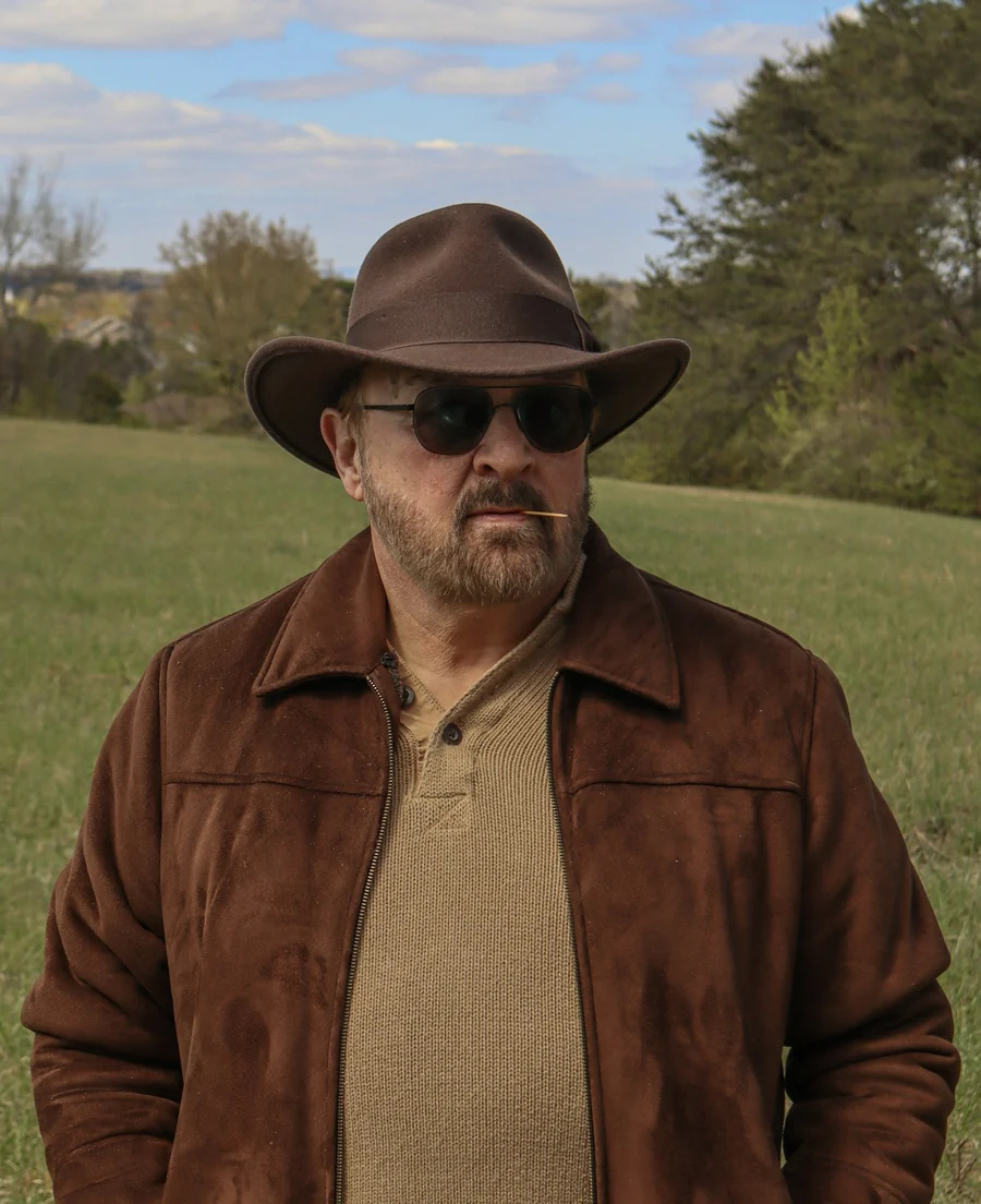 Older man standing in a Tennessee field